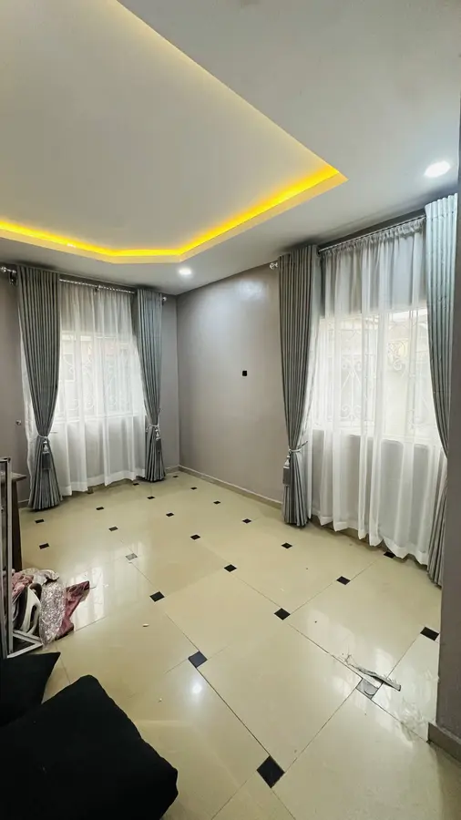 Sage curtains in a living room with diamond pattern floor tile