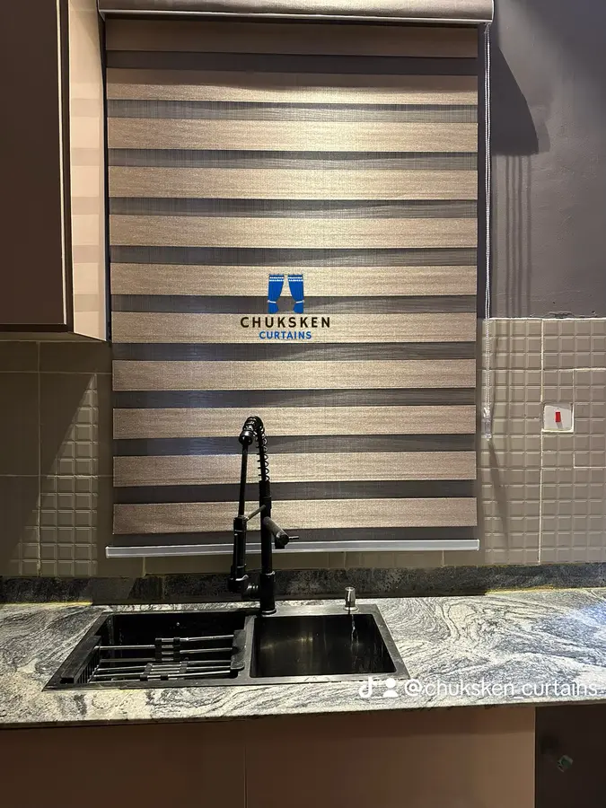 Zebra roller blind fitted above a kitchen sink
